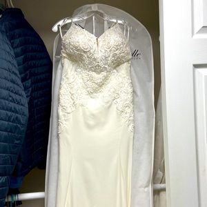 Ivory wedding gown from upscale sorelle dress shop